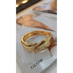 Glow | Bracelete Dourada curva com ponta dupla